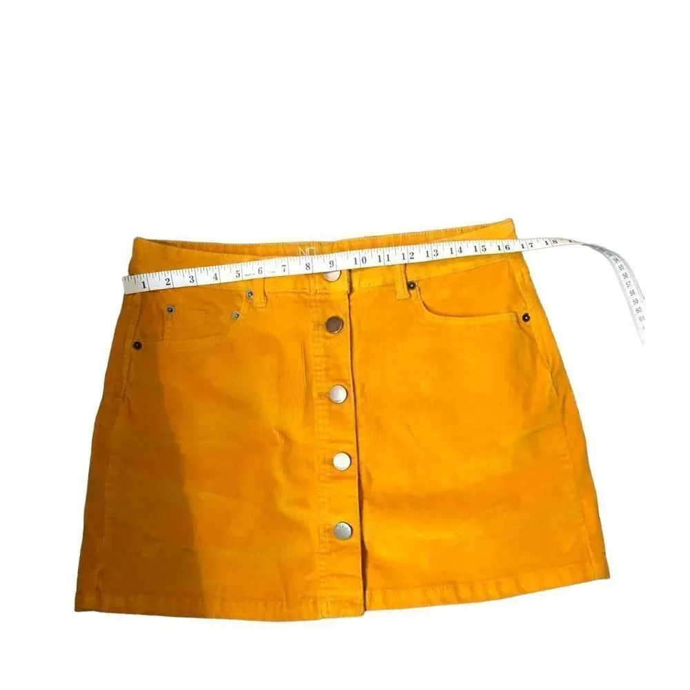 No Boundaries corduroy style vibrant orange gold button down front mini skirt